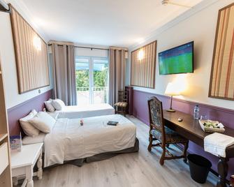 Chenal Hotel - Beauvais - Schlafzimmer