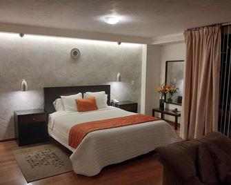 Suites Metropoli - Quito - Habitación