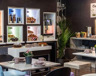 Novotel Suites Malaga Centro - Malaga - Eetruimte
