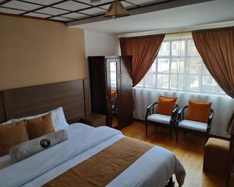 Aleidas Hostal - Quito - Habitación