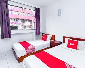 OYO 90185 168 Inn - Bintulu - Bedroom